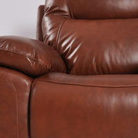Close-up of a brown leather sofa