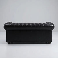 antique-black-leather-chesterfield-sofa-with-deep-buttoning