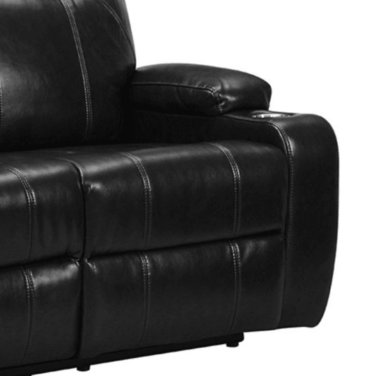Close-up of a black leather recliner sofa on a white background