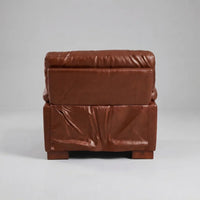 tan-leather-armchair