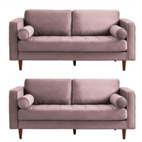 Two identical mauve sofas with wooden legs on a white background