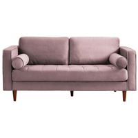 Pink sofa with wooden legs on a white background
