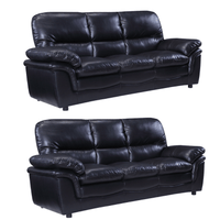 Two black leather sofas