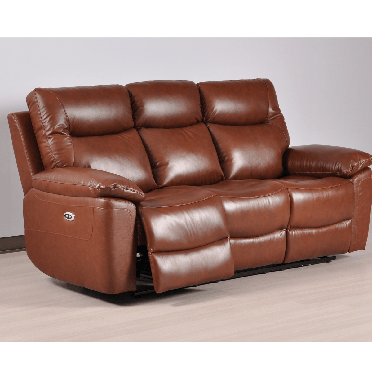 Brown leather recliner sofa on a plain background