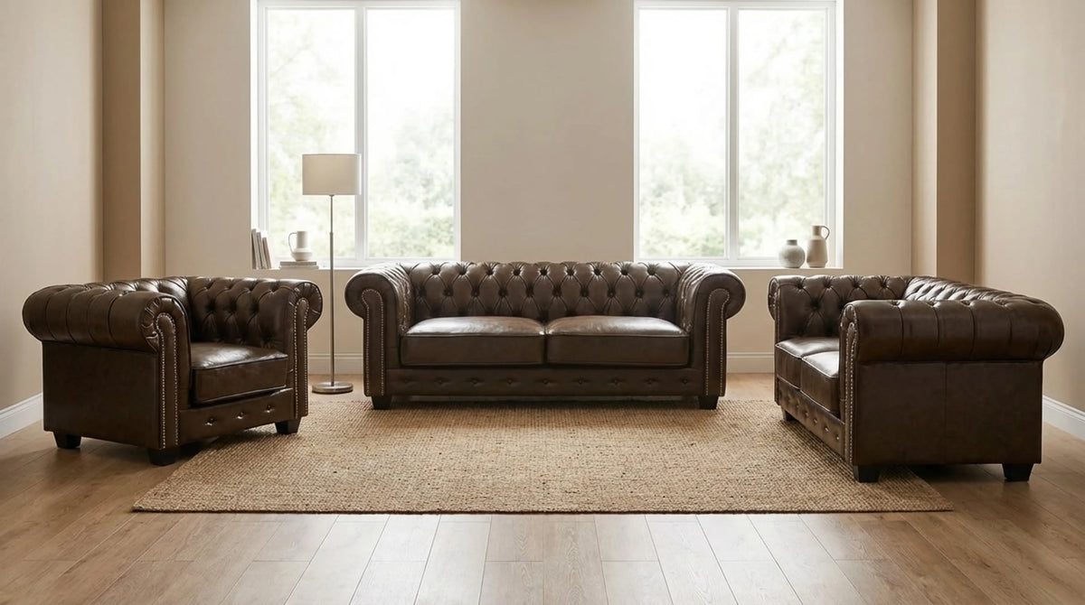 Brown Chesterfield leather sofa set styled in a living room