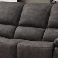 Grey sofa with a textured surface in a room setting