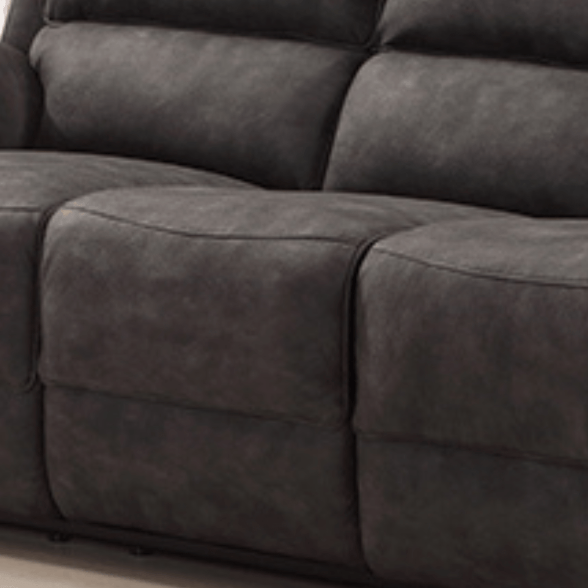 Grey fabric sofa with multiple cushions on a neutral background